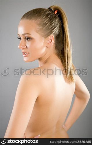 studio photo of beautiful woman with long hair