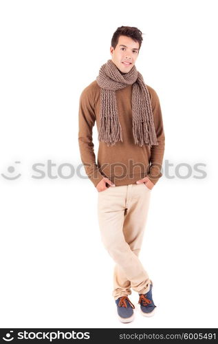 Studio picture of a happy young boy dressed for winter