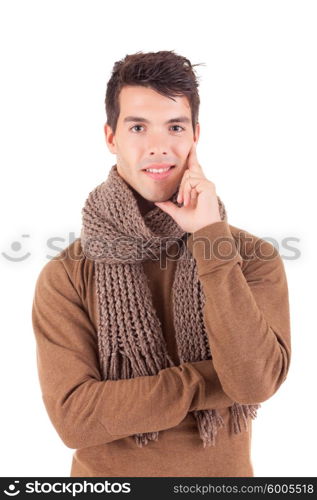 Studio picture of a happy young boy dressed for winter