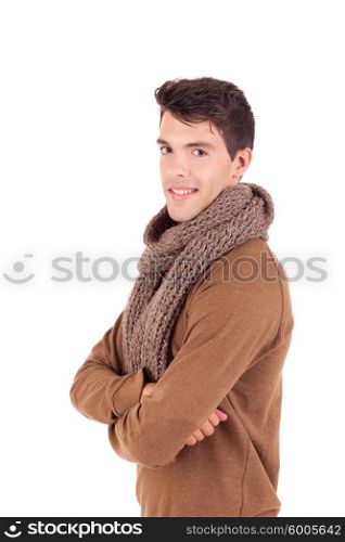 Studio picture of a happy young boy dressed for winter