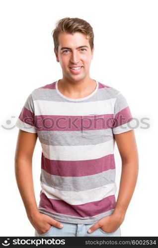 Studio picture of a young and handsome man posing isolated