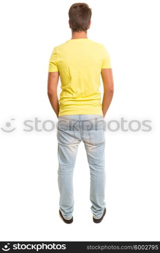 Studio picture of a young and handsome man posing isolated