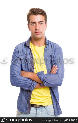 Studio picture of a young and handsome man posing isolated