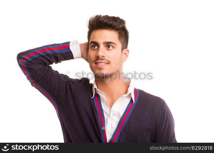 Studio picture of a young and handsome man posing isolated