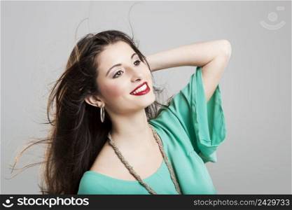 Studio portrait of a beautiful and atractive fashion woman posing
