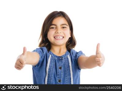 Studio portrait of a beautiful girl with thumbs up, isolated over white background