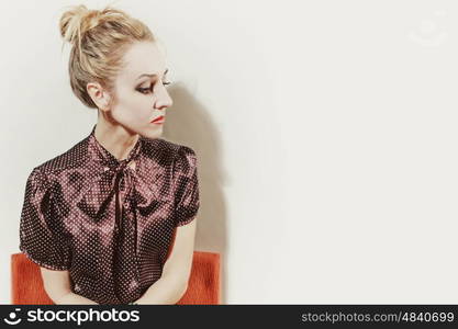 Studio portrait of a beautiful young blonde woman