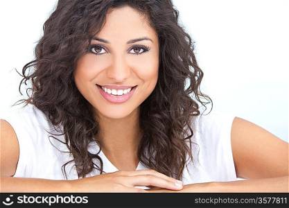 Studio portrait of a beautiful young Latina Hispanic woman smiling