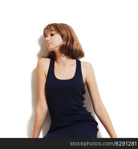 Studio portrait of a beautiful young woman on white background