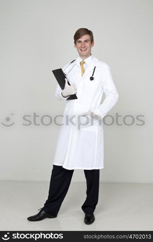 Studio portrait of a confident young doctor