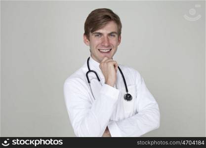 Studio portrait of a confident young doctor