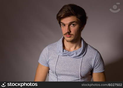 Studio portrait of a handsome young man