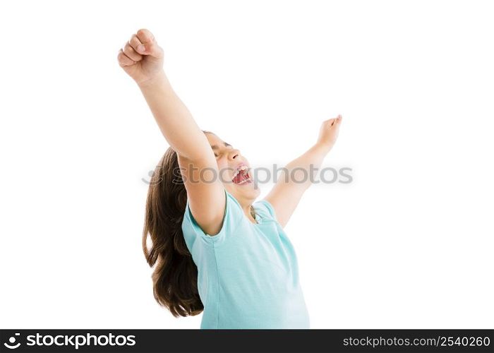 Studio portrait of a happy girl with arms raised on air