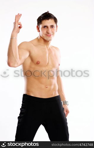 Studio portrait of a muscleman, beauty male body