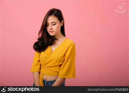 studio portrait of asian woman in casual clothing feeling sad unhappy sorry depressed