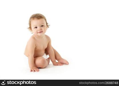 Studio Portrait Of Baby Boy Sitting