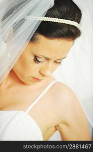 Studio portrait of beautiful stylish bride