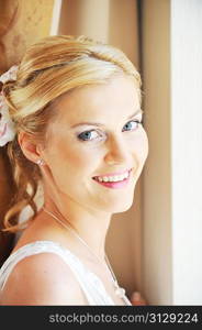 Studio portrait of beautiful stylish bride