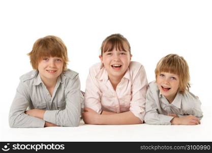 Studio Portrait Of Brothers And Sister