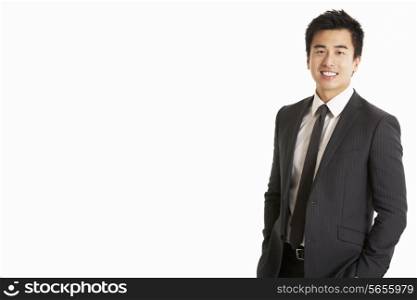Studio Portrait Of Chinese Businessman