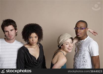 Studio portrait of four young people