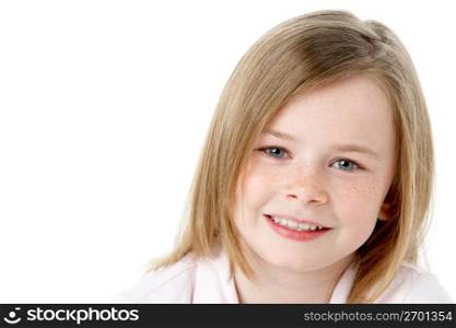 Studio Portrait Of Happy Young Girl