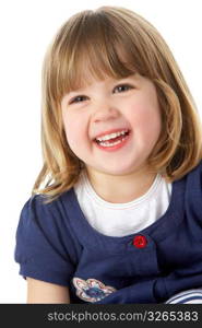 Studio Portrait Of Laughing Young Girl