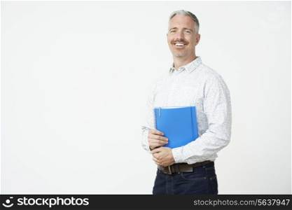 Studio Portrait Of Male Pre School Teacher