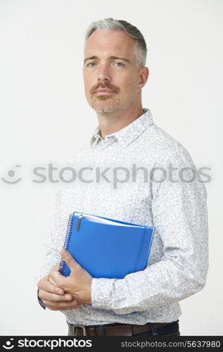 Studio Portrait Of Male Pre School Teacher