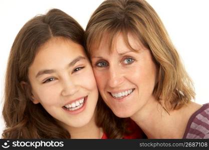 Studio Portrait Of Mother And Daughter