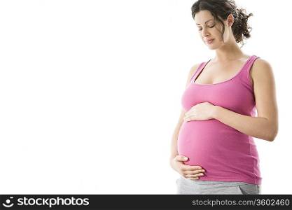 Studio portrait of pregnant woman