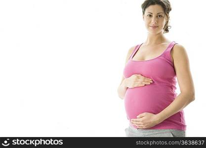 Studio portrait of pregnant woman
