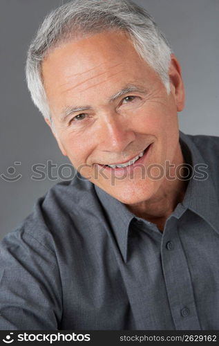 Studio Portrait Of Senior Man