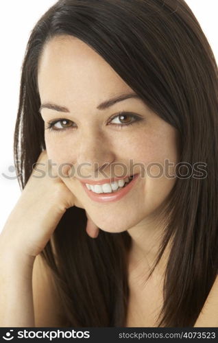 Studio Portrait Of Smiling Woman