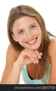 Studio Portrait Of Smiling Young Woman