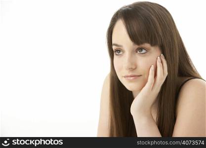 Studio Portrait Of Teenage Girl On White Background