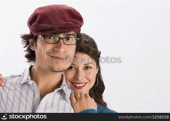 Studio portrait of young couple