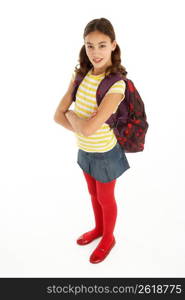 Studio Portrait Of Young Girl With Backpack