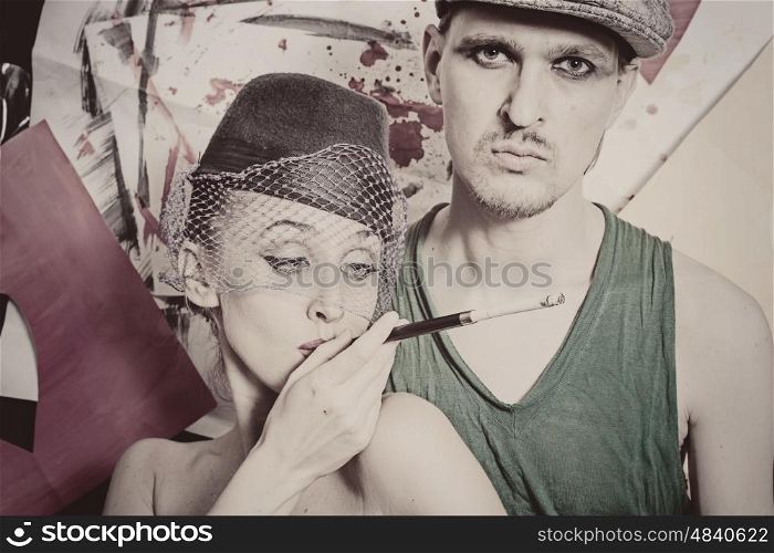 Studio portrait of young men and women in retro style