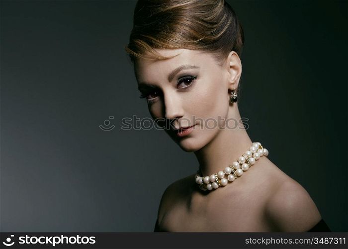 studio portrait of young woman, classic retro styling