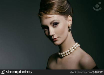 studio portrait of young woman, classic retro styling