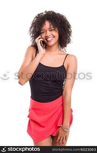 Studio shot: beautiful african woman at the phone