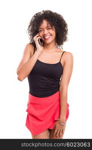 Studio shot: beautiful african woman at the phone