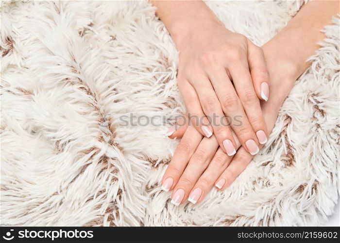 studio shot Beautiful Female Hands with French manicure.. studio shot Beautiful Female Hands with French manicure