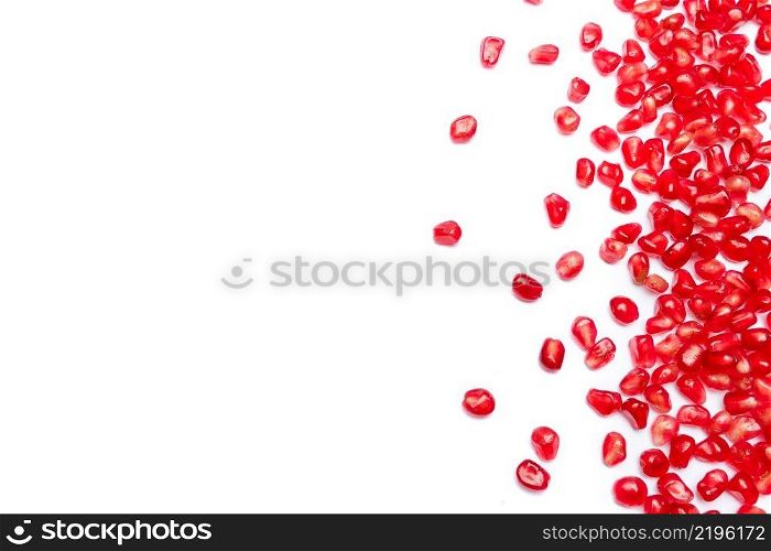 studio shot - frame of Pomegranate seeds on white background. frame of Pomegranate seeds on white background