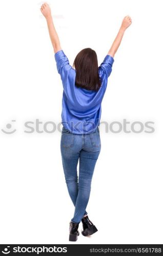 Studio shot: Happy woman with raised arms
