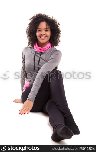 Studio shot of a beautiful african woman exercising