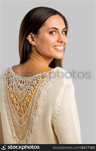 Studio shot of a beautiful young woman smiling