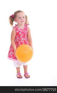Studio shot of a little girl with a balloon