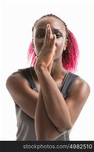 Studio shot of a young fit african woman doing yoga exercises isolated on white background